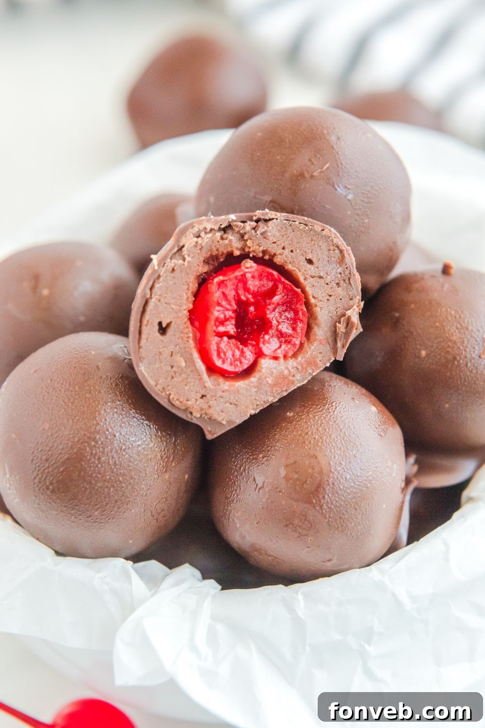 A Cherry Brownie Bomb cut in half to beautifully display the cherry center