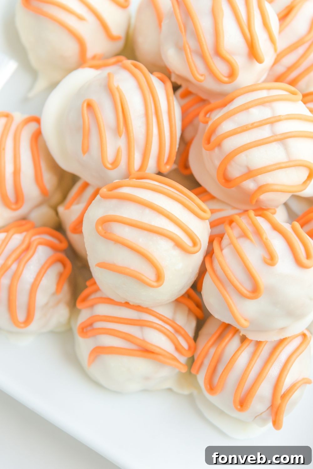 Plate of pumpkin spice truffles, showcasing their inviting appearance.