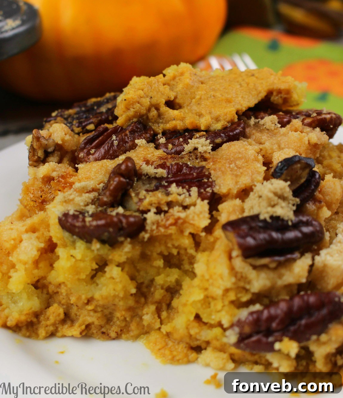 Easy Pumpkin Pecan Dump Cake 16 Pumpkin Pecan Dump Cake served with whipped cream and a sprinkle of cinnamon