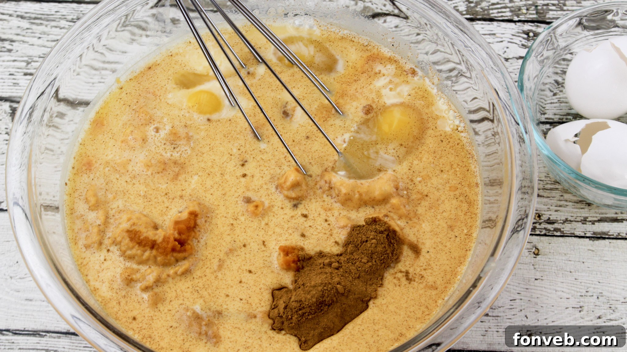 Easy Pumpkin Pecan Dump Cake 4 Close-up of Pumpkin Pecan Dump Cake layers showing pumpkin pie, cake, and pecans