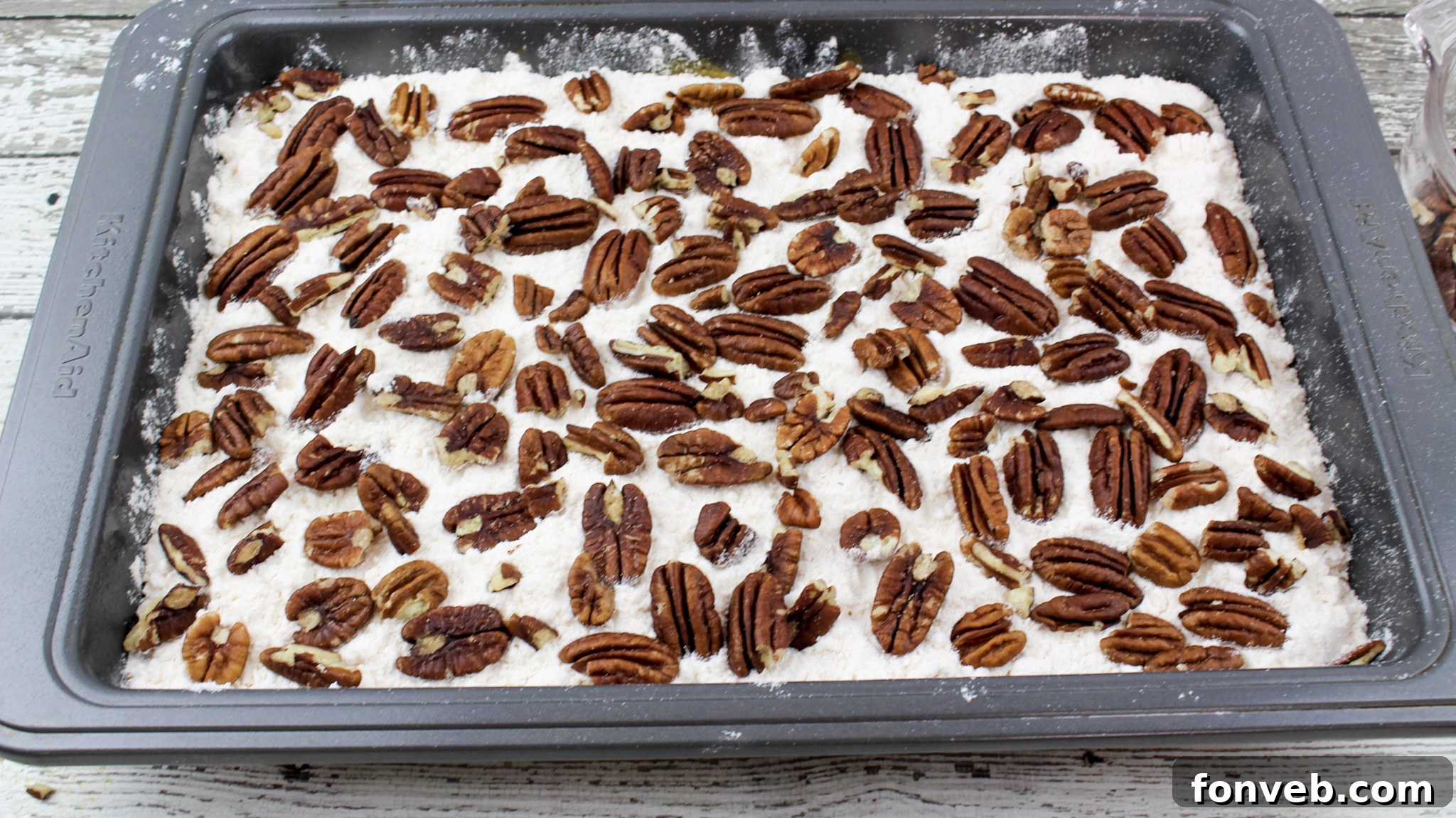 Easy Pumpkin Pecan Dump Cake 8 Pecan pieces generously spread over the cake mix layer for a crunchy topping