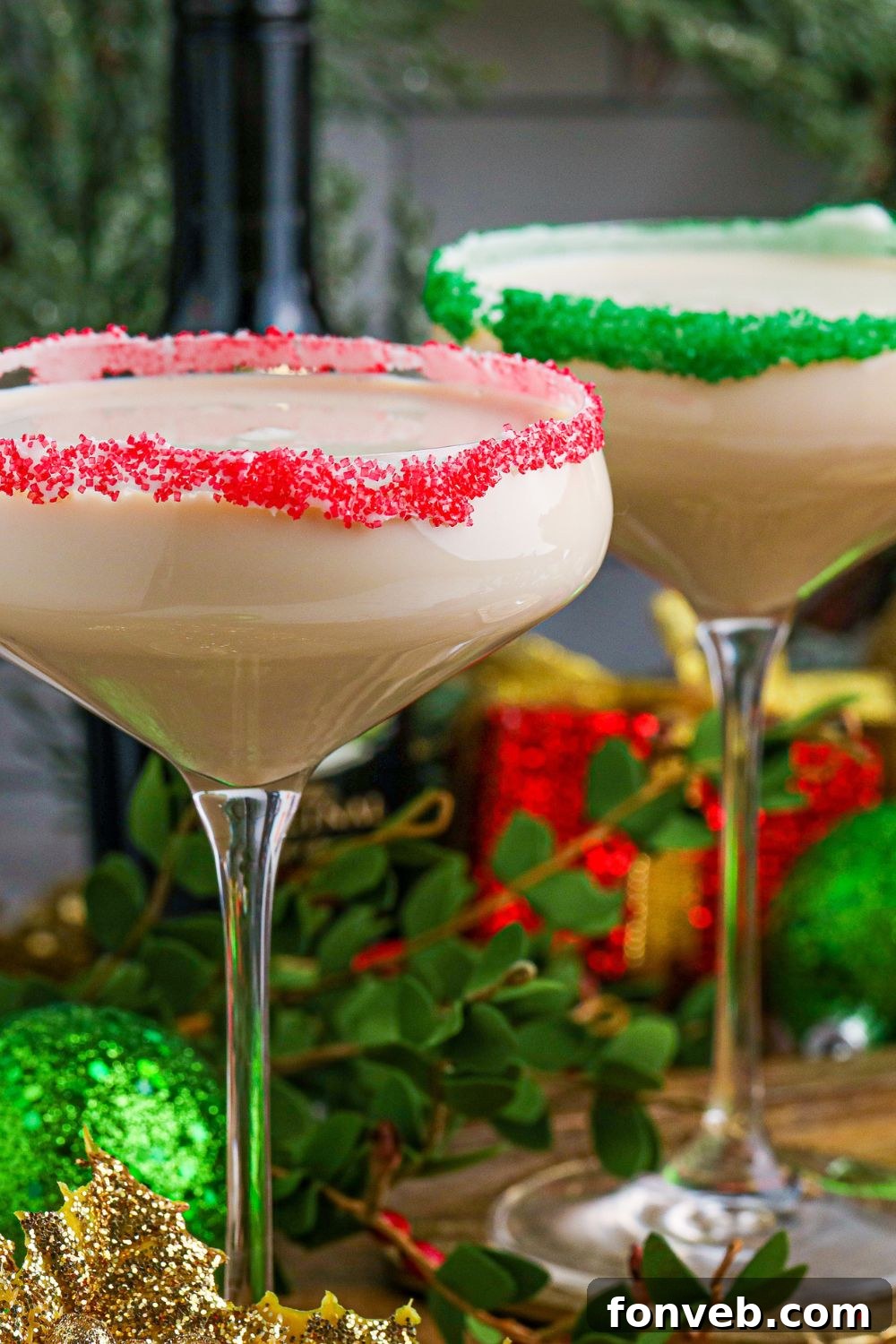 A close-up of a single cocktail glass filled with a creamy Sugar Cookie drink, showcasing its inviting texture and festive appearance.