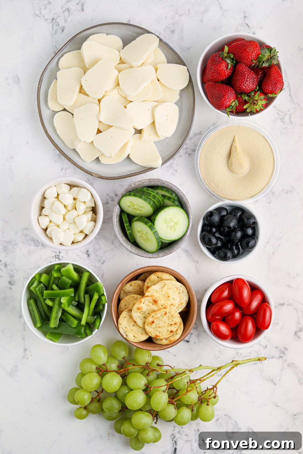 ingredients of snack tray ingredients on a table 