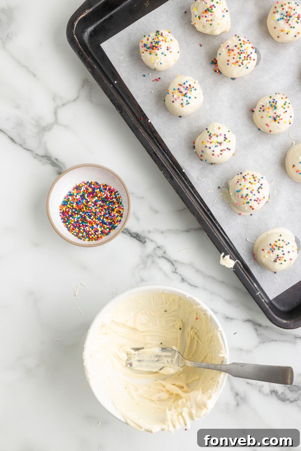 white chocolate truffles on a baking tray 