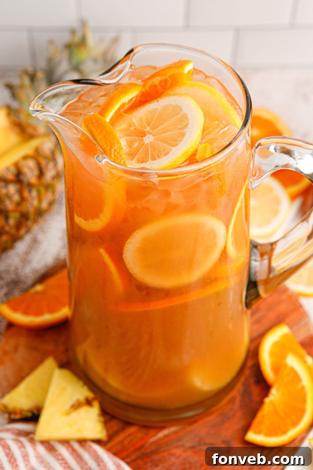 Endzone Chill 13 A pitcher of bourbon iced tea on a table.