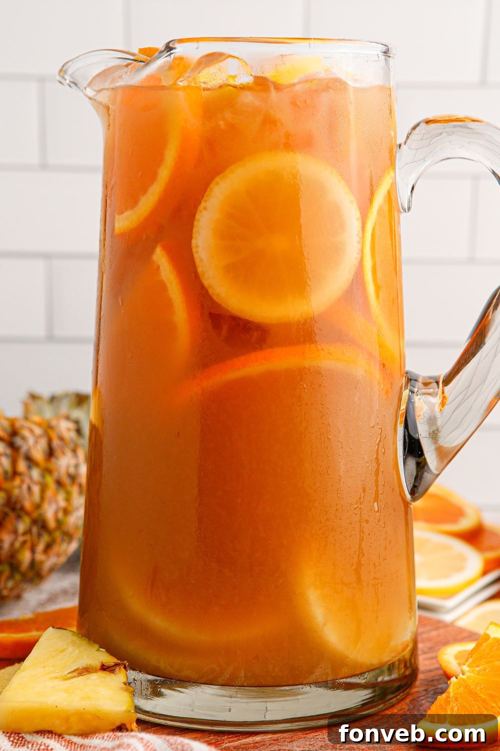 Endzone Chill 17 Touchdown Tea in a pitcher with fruit slices inside.