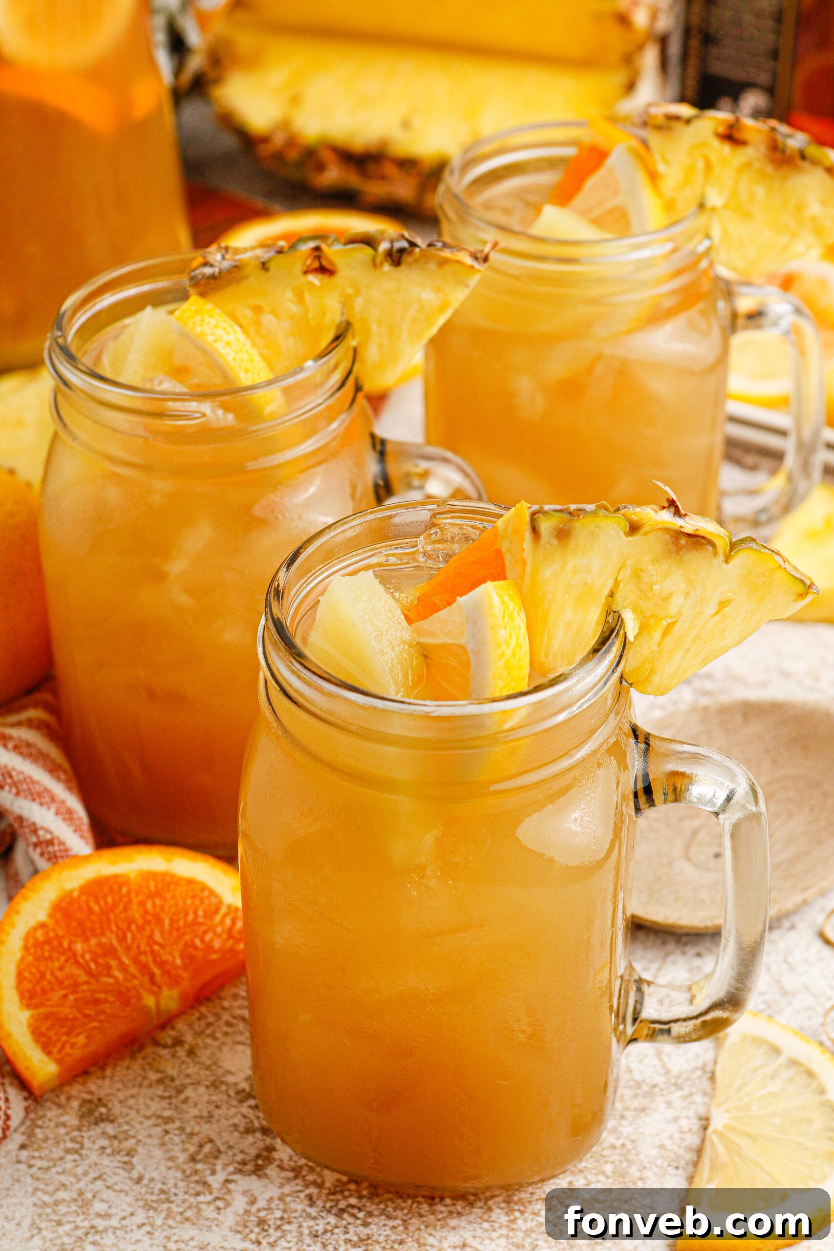 Endzone Chill 9 Touchdown Tea in a large glass pitcher, showcasing the fruit slices.