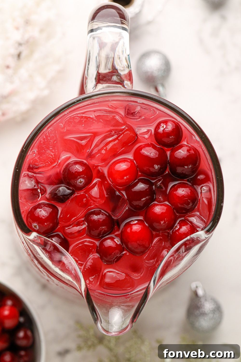 Mistletoe Magic Margarita 16 A mini cranberry rosemary margarita, showcasing its intricate details.