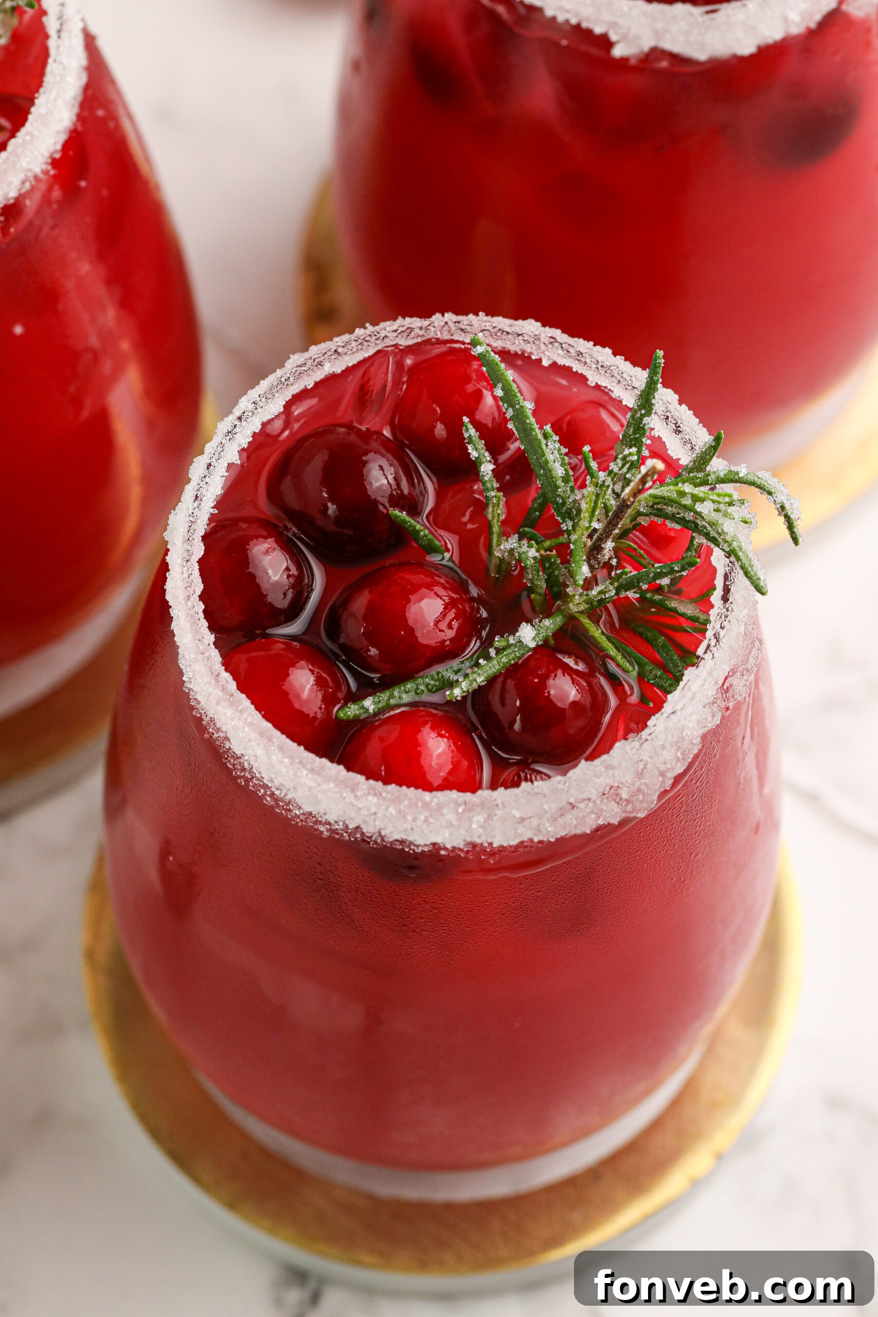 Mistletoe Magic Margarita 18 A close-up view of a Mistletoe Margarita glass with a white sugar rim.