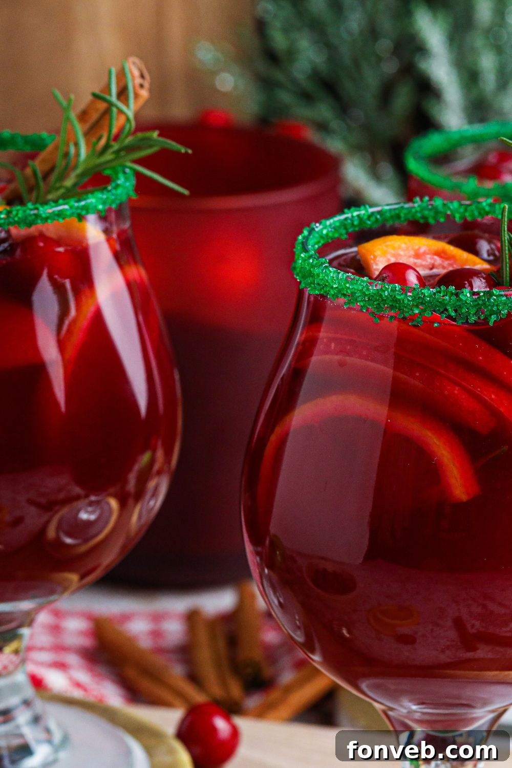 red wine with fruit in glasses on table 
