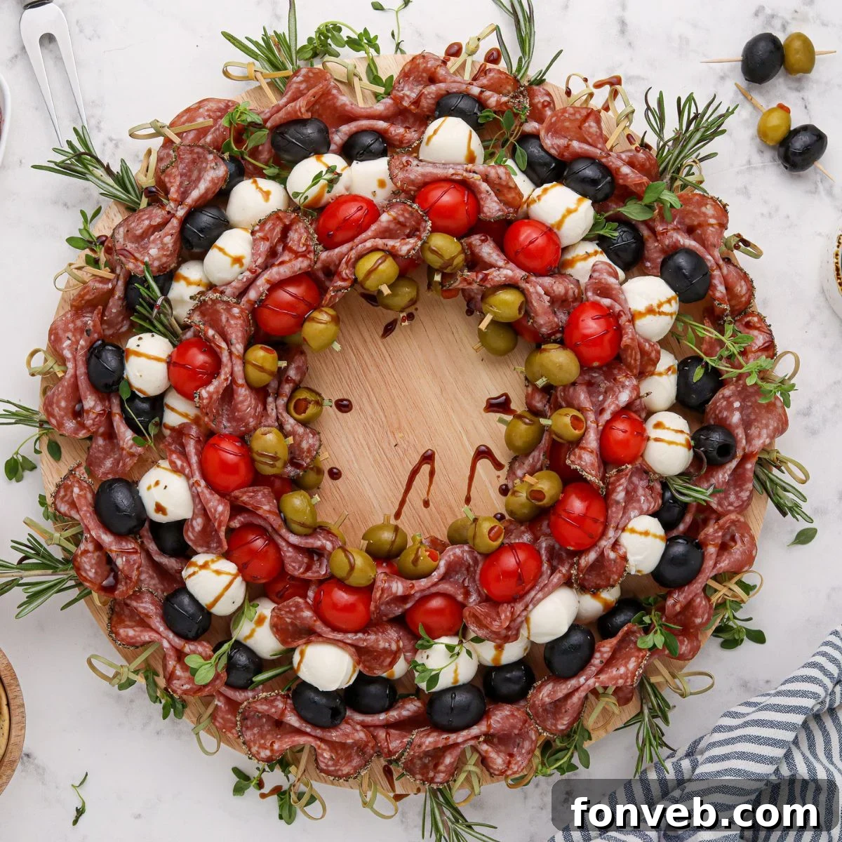 Antipasto Wreath on table showcasing fresh ingredients and festive arrangement