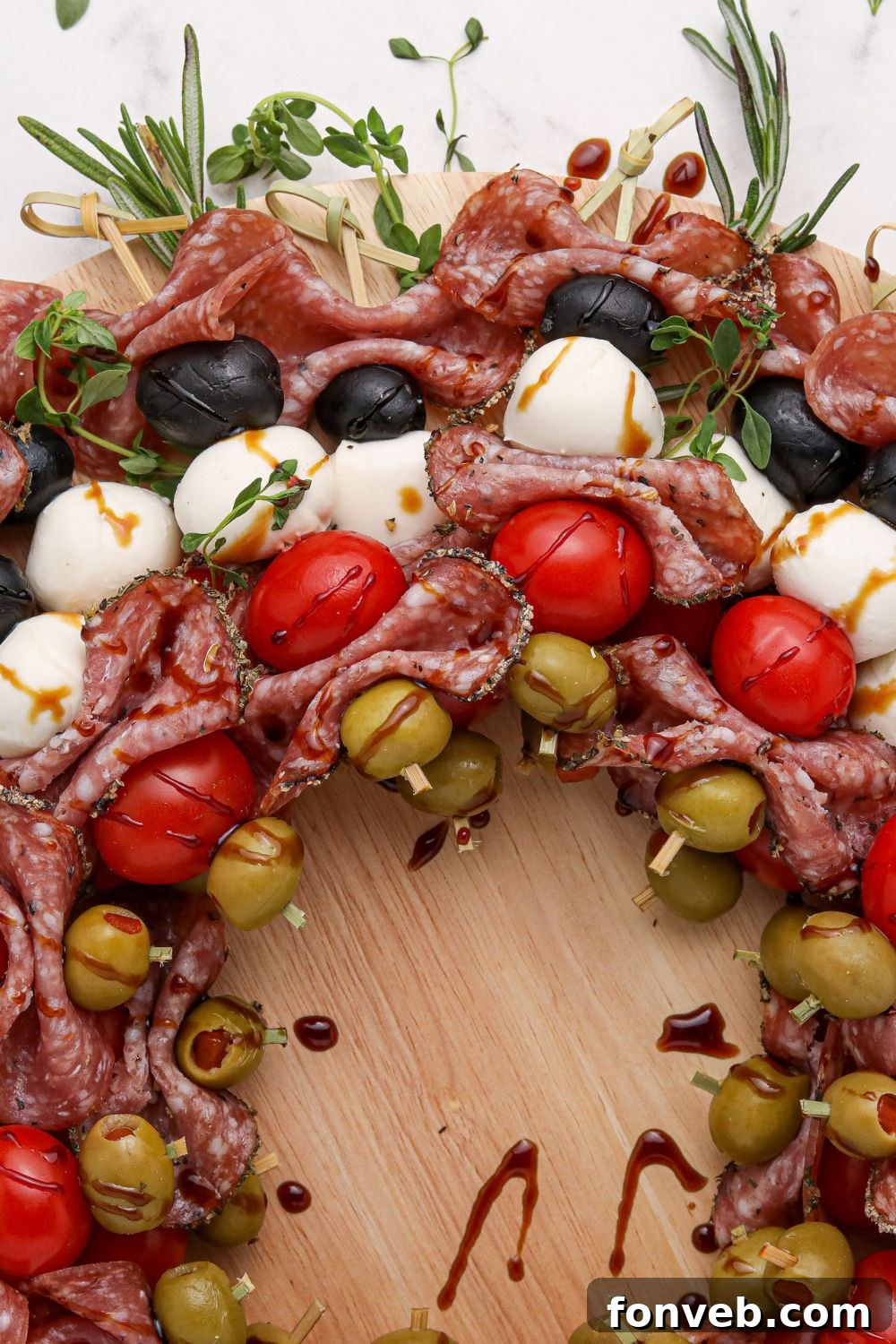 Overhead view of antipasto skewers arranged on a platter