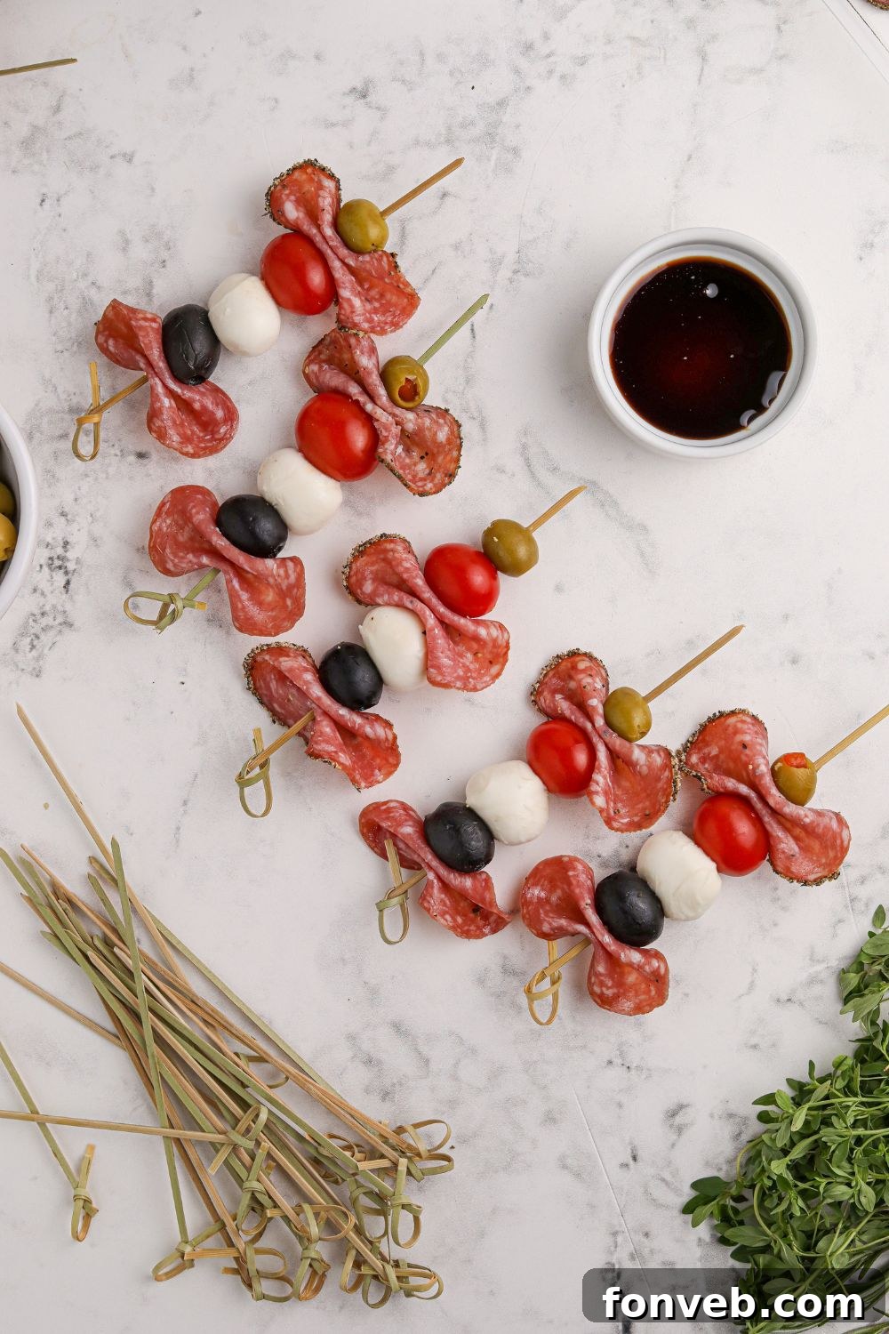 Antipasto ingredients assembled on individual skewers