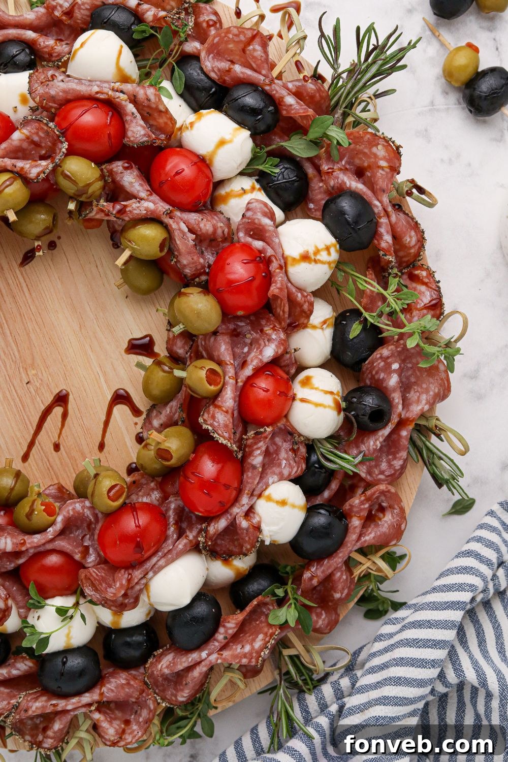 Side view of an antipasto wreath beautifully arranged on a platter