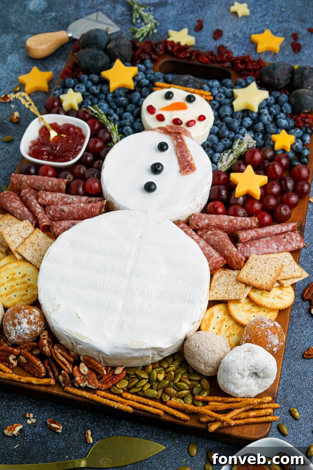 Side angle of the beautifully arranged serving tray with the snowman charcuterie board