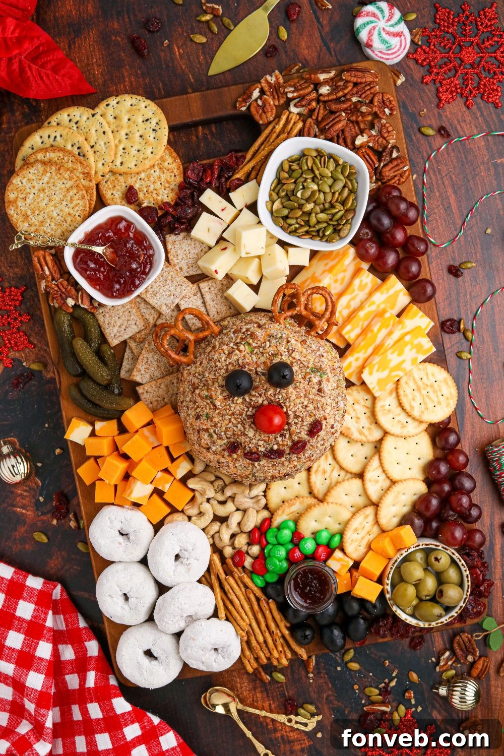 Rudolph's Holiday Charcuterie Platter 11 Finished cheeseball and snack board on a festive table