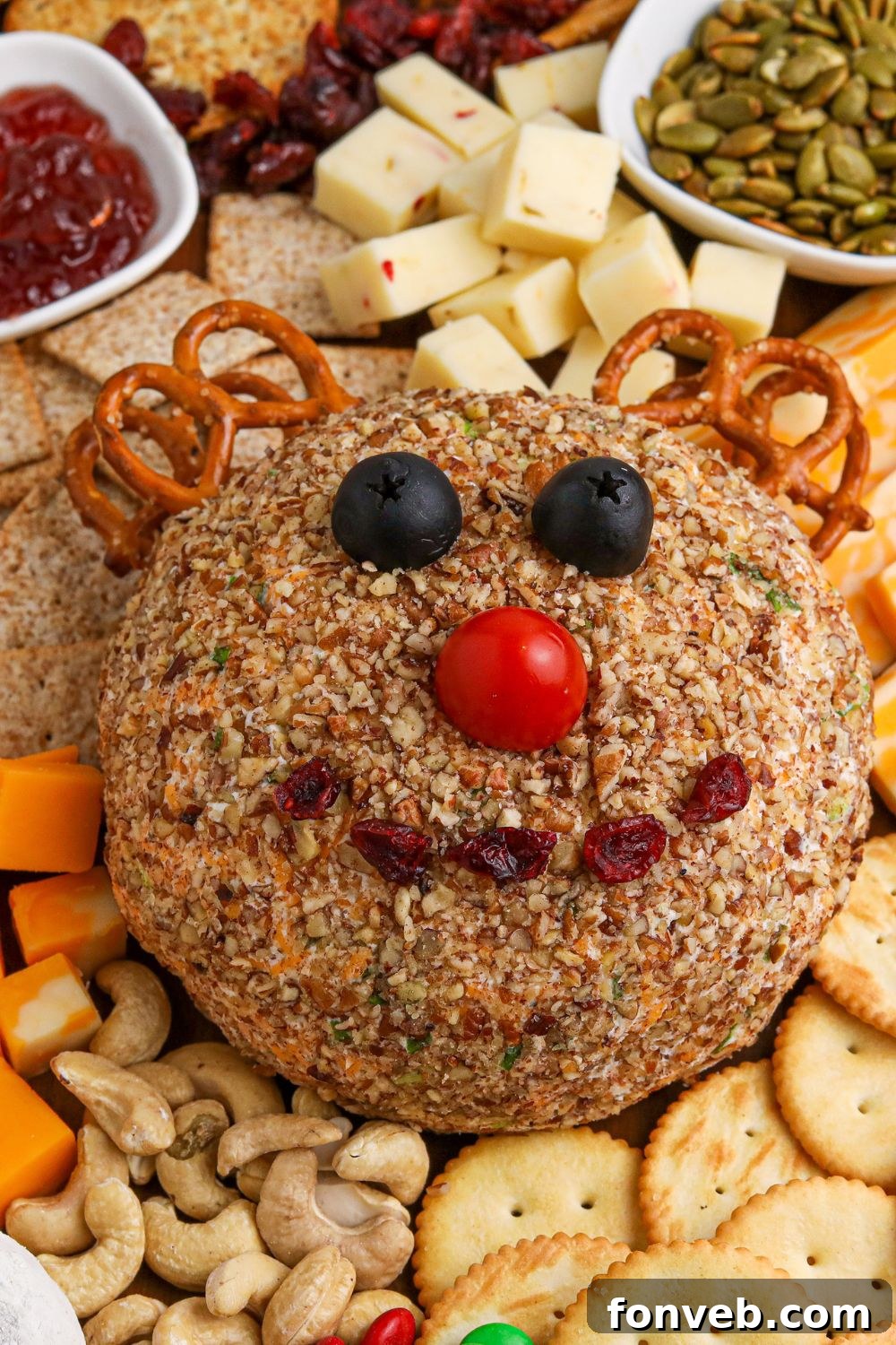 Rudolph's Holiday Charcuterie Platter 16 Close-up of reindeer cheese ball on a festive snacking tray