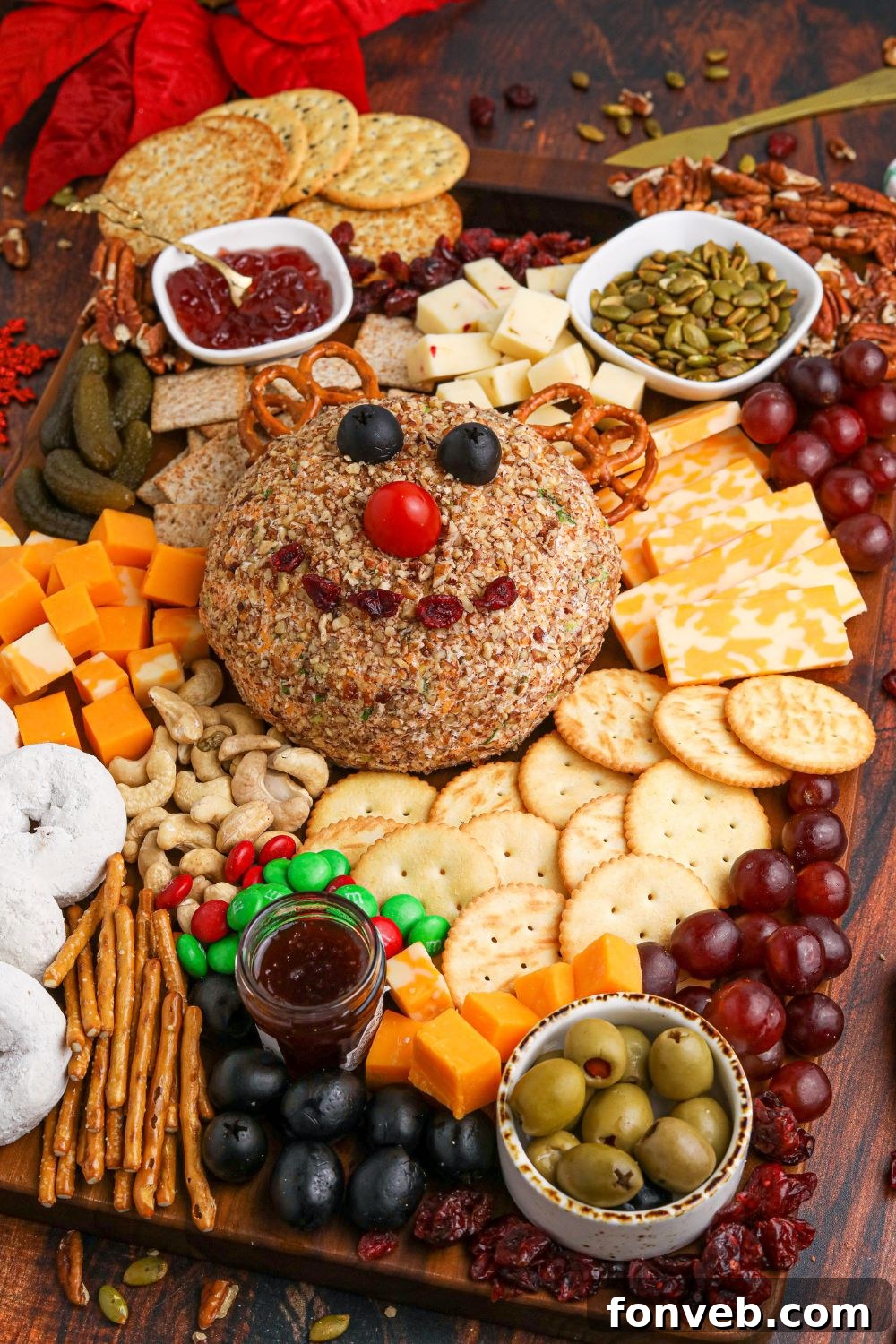 Rudolph's Holiday Charcuterie Platter 17 Side view of a Christmas charcuterie board on a table with holiday decor