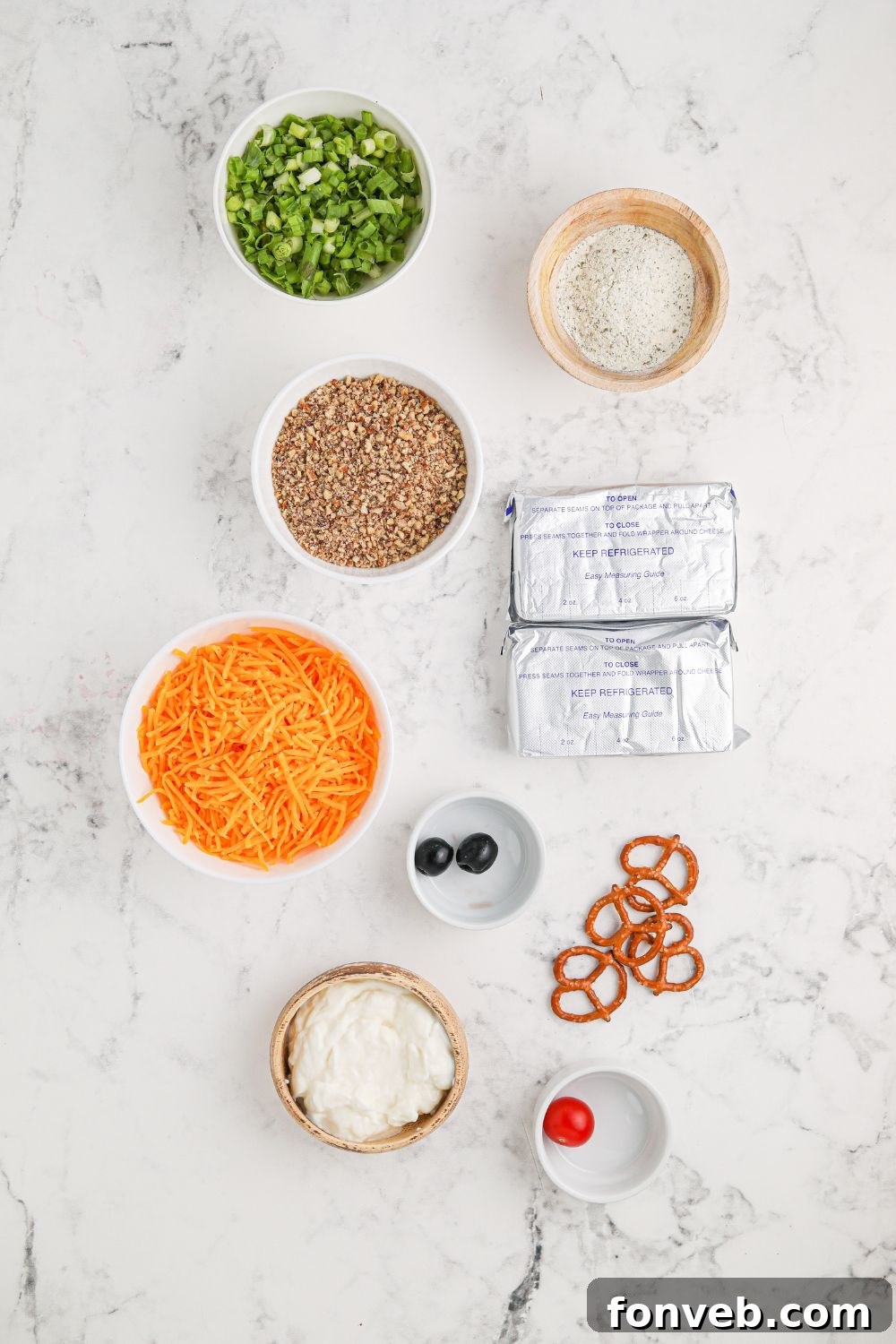 Rudolph's Holiday Charcuterie Platter 4 Ingredients laid out for cheeseball on a rustic table