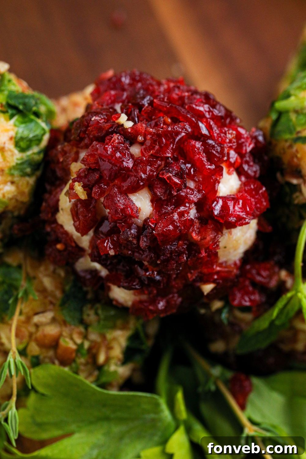 A scattered arrangement of mini cheese balls on a table, highlighting their readiness for a party.