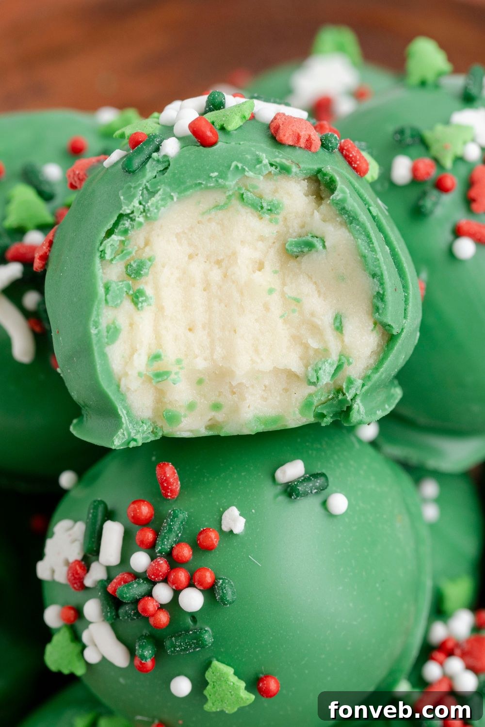 Lofthouse's Signature Christmas Truffles 12 sugar cookie truffles in bowl with a bite taken out of it