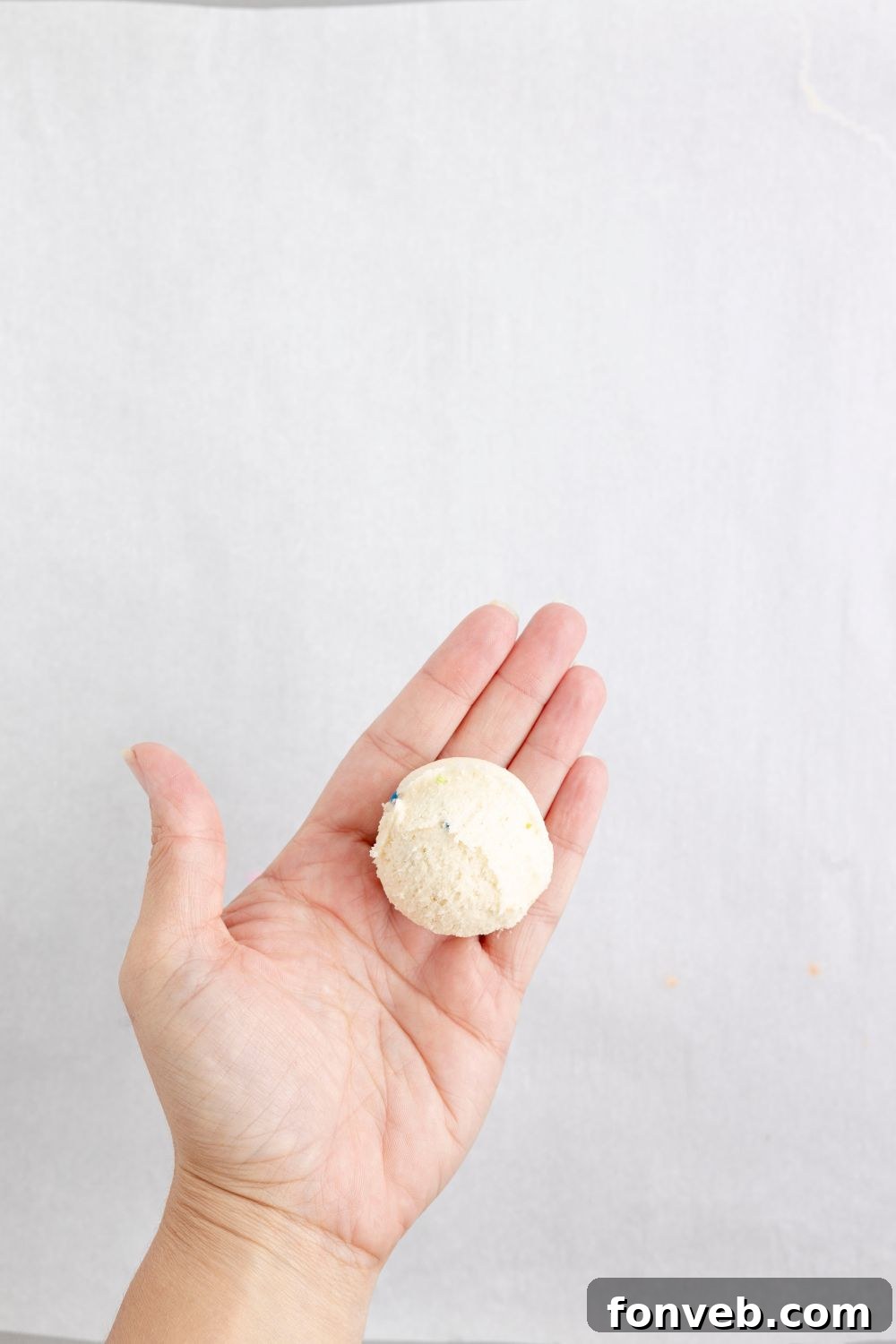 Lofthouse's Signature Christmas Truffles 8 sugar cookie truffle in hand