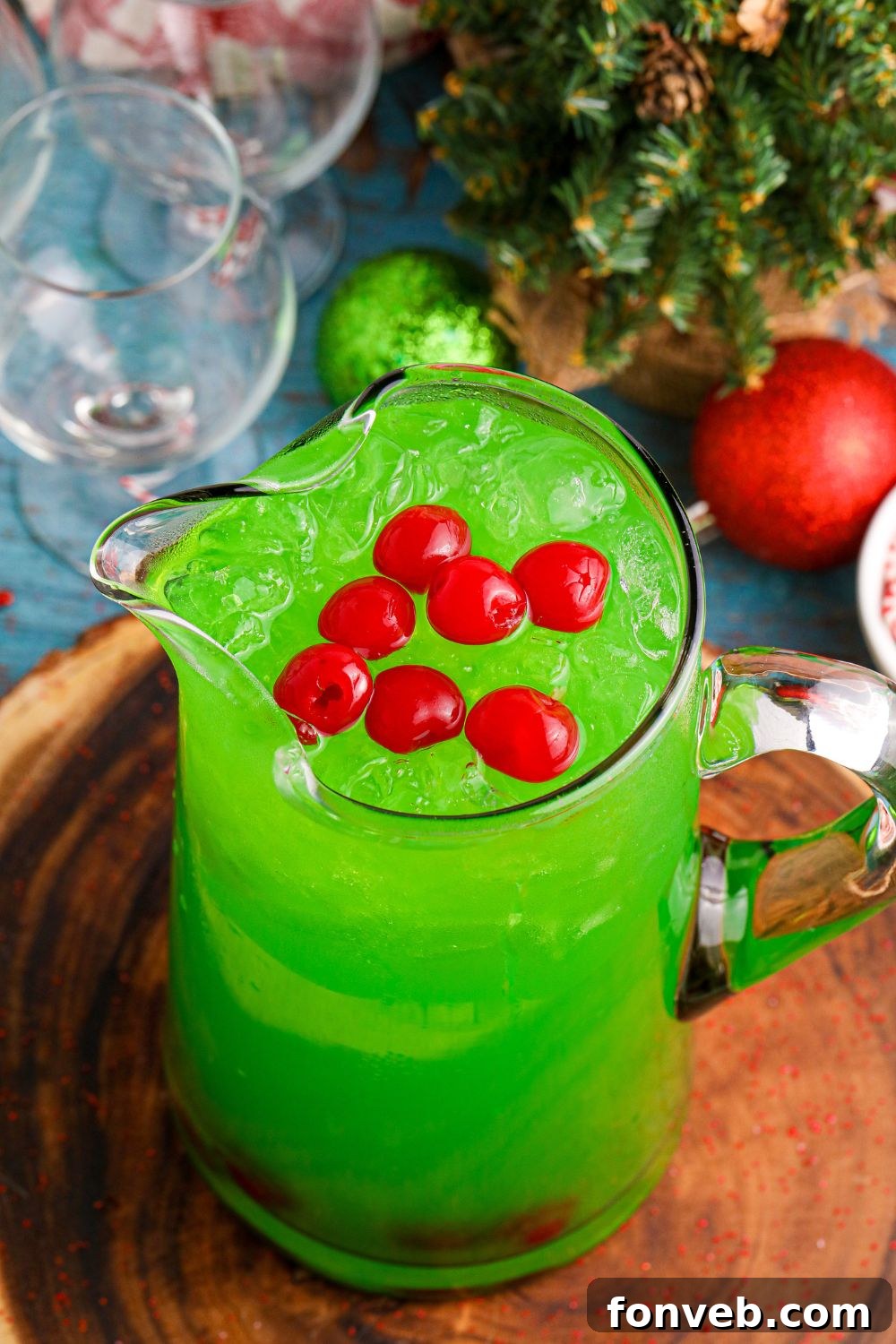 overhead shot of punch in a bowl on wooden cutting board 