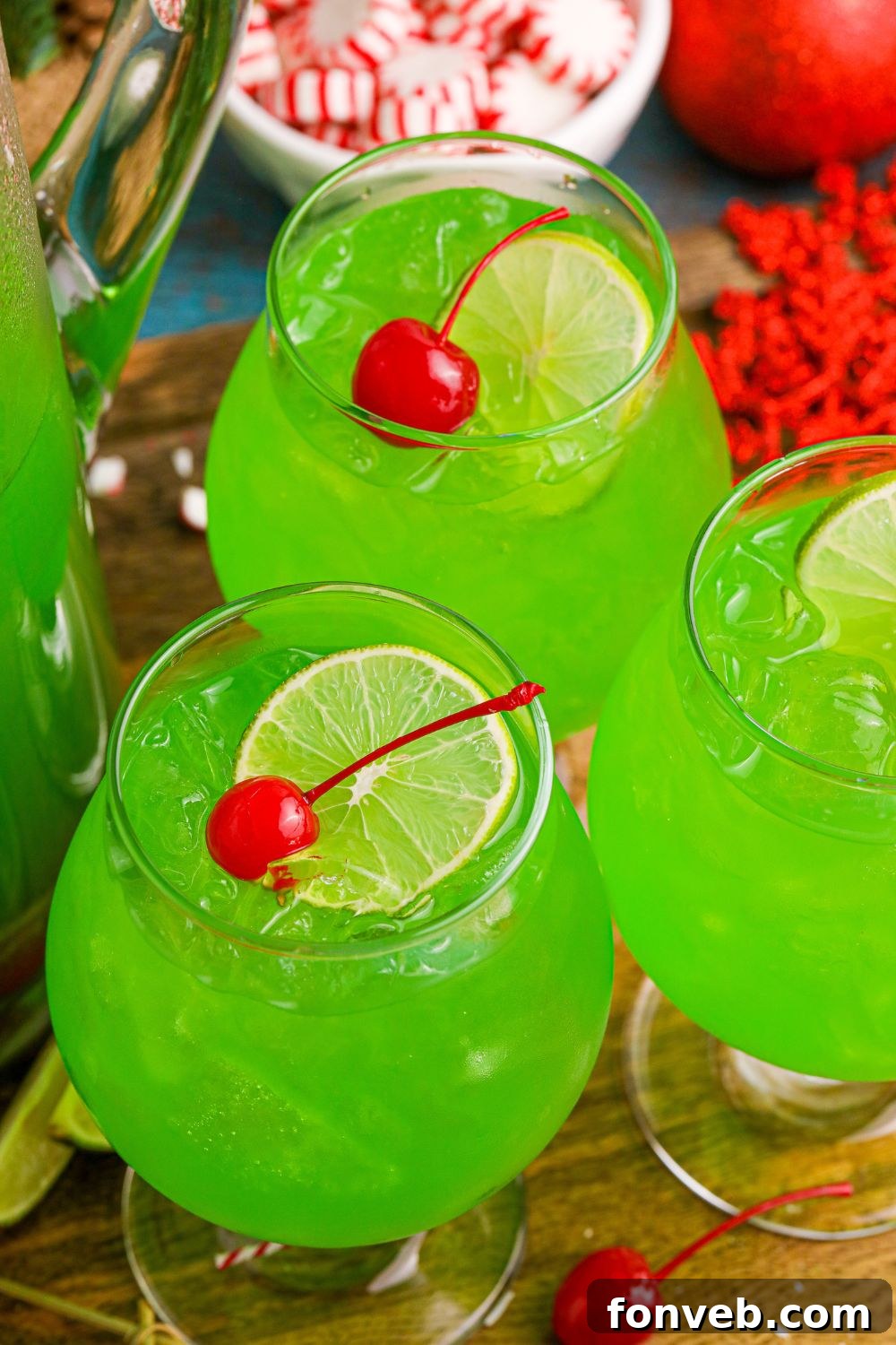 glasses on table full of a green punch