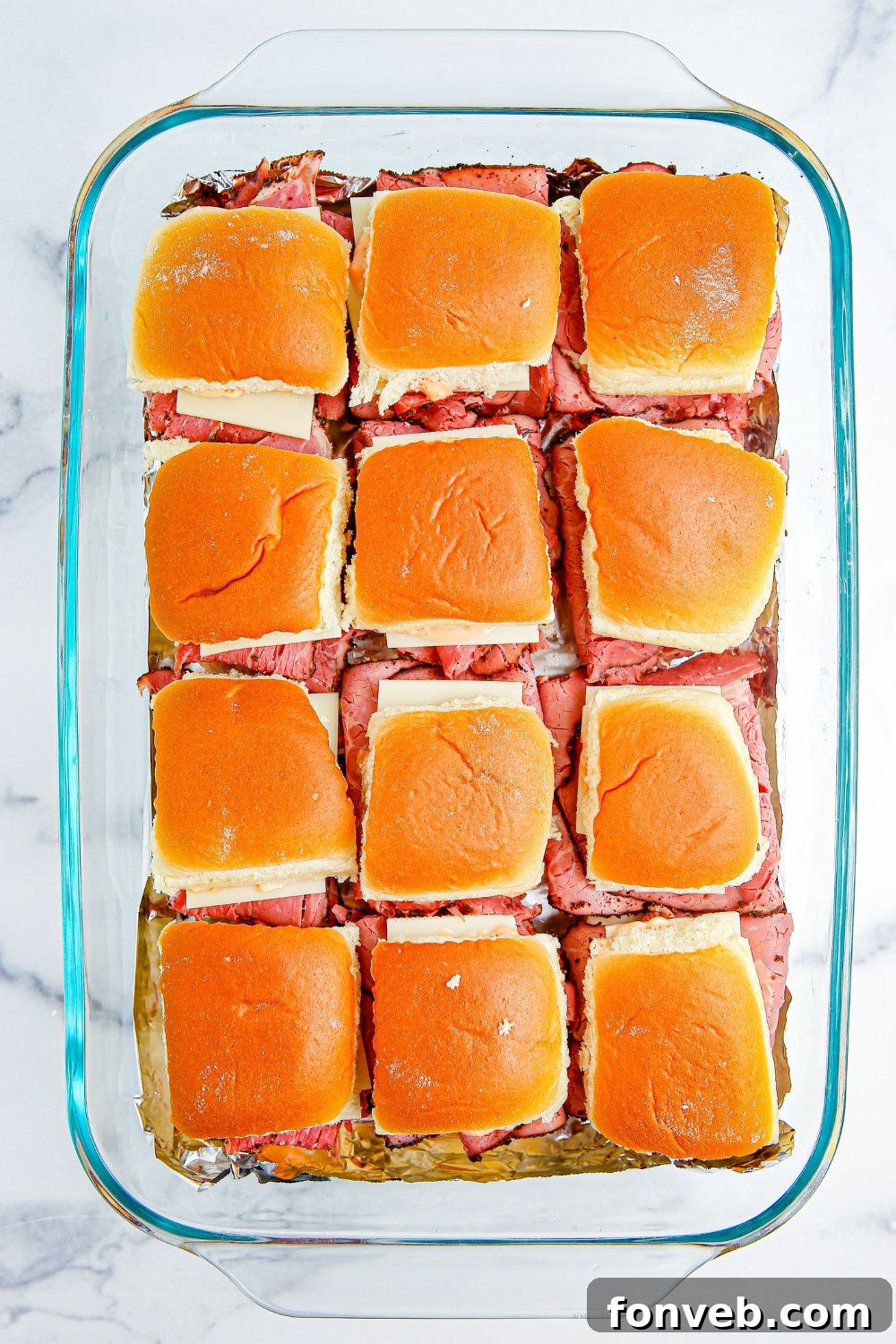 sliders in a 9x13 pan on table 