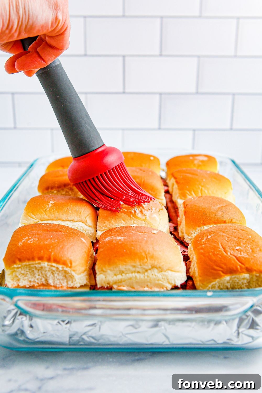 basting sliders in pan 