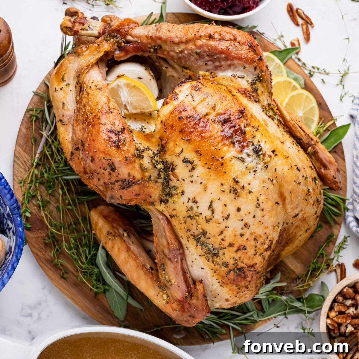 whole roasted turkey on a platter on table 