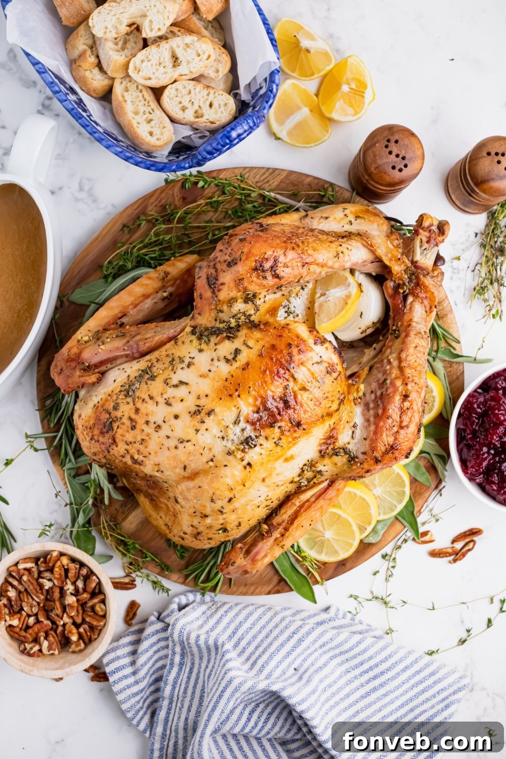 turkey on a platter with garnishes around it