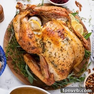 whole roasted turkey on a platter on table