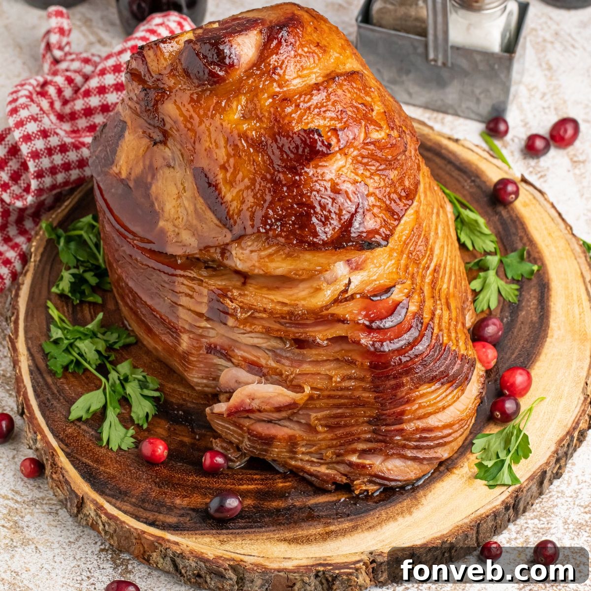 Coca Cola Ham on a wooden platter with garnish around it