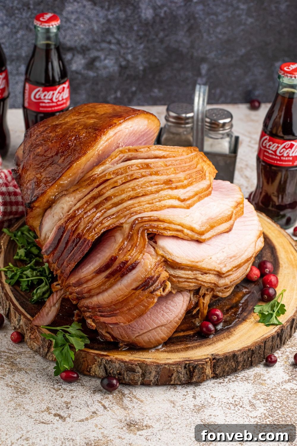 holiday ham on table with bottles of coca cola