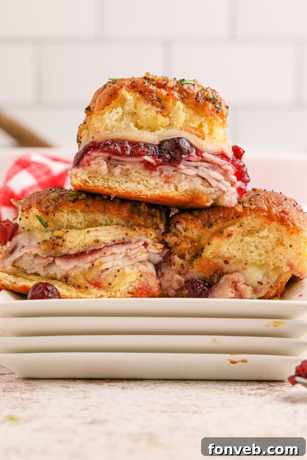 Thanksgiving sliders arranged attractively on various platters, ready for a gathering