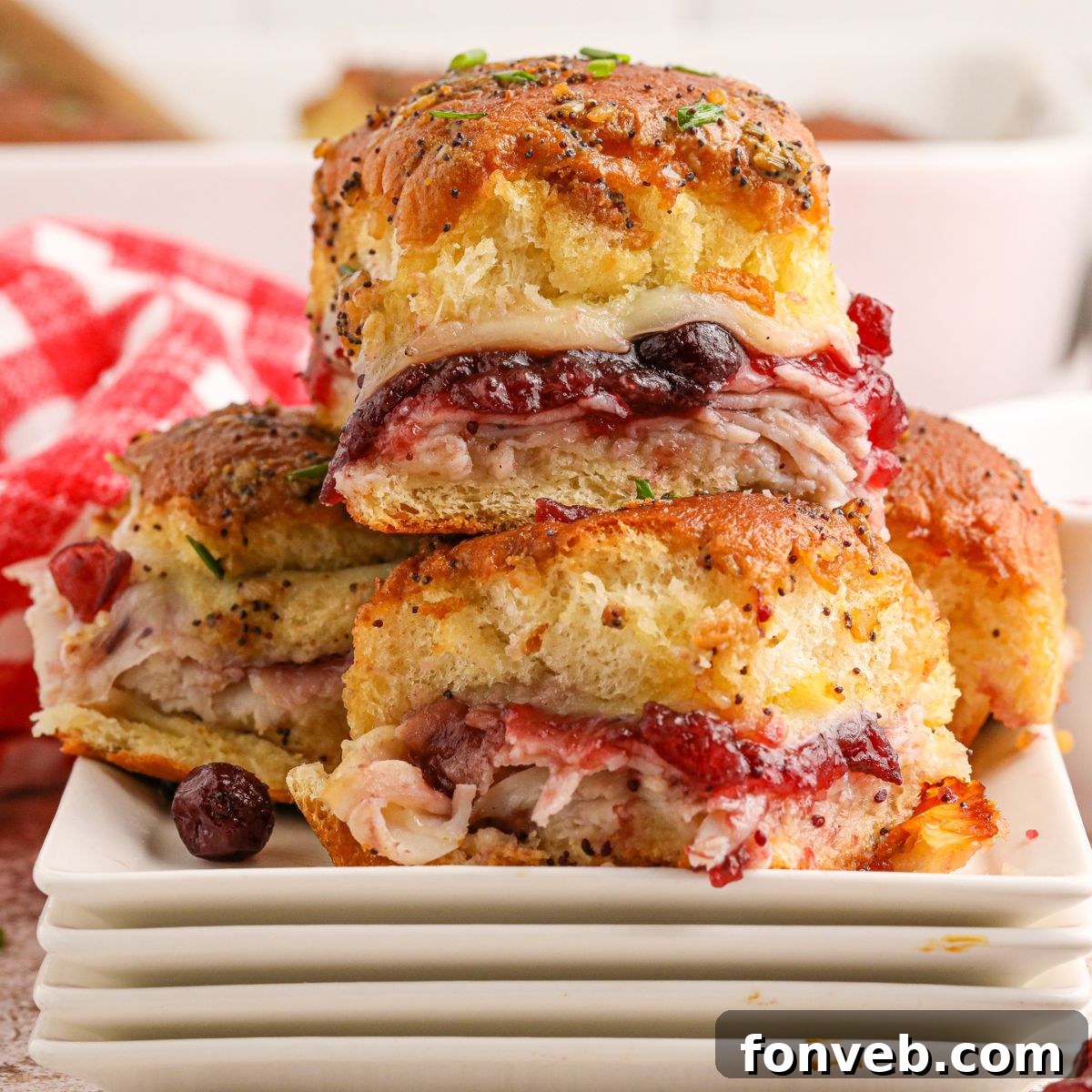 Thanksgiving Sliders neatly arranged on plates, ready to be served as a festive meal or appetizer