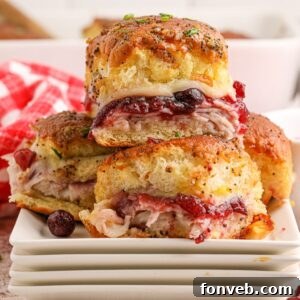Thanksgiving Sliders stacked on plates on table