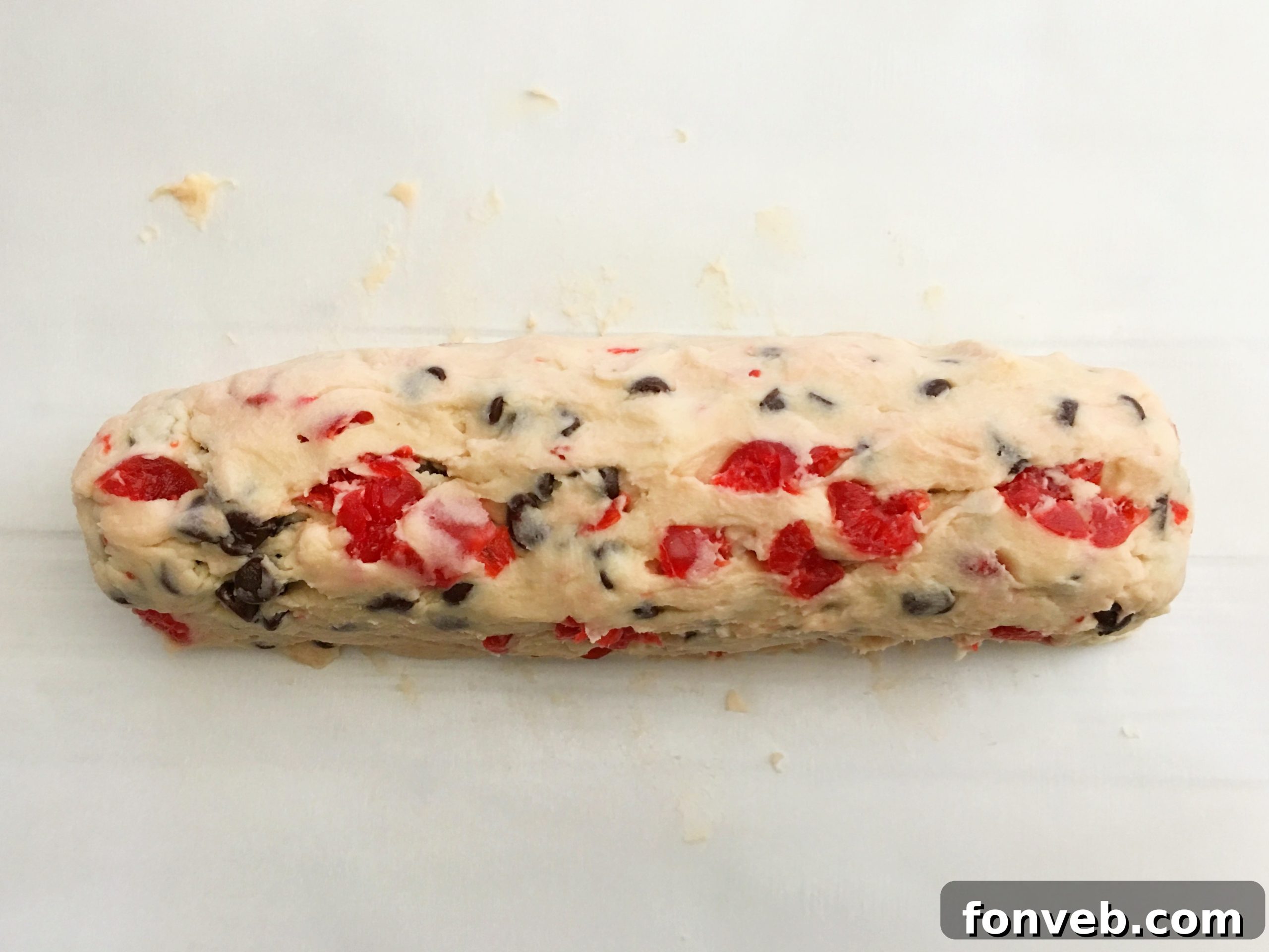 rolling shortbread dough into a log