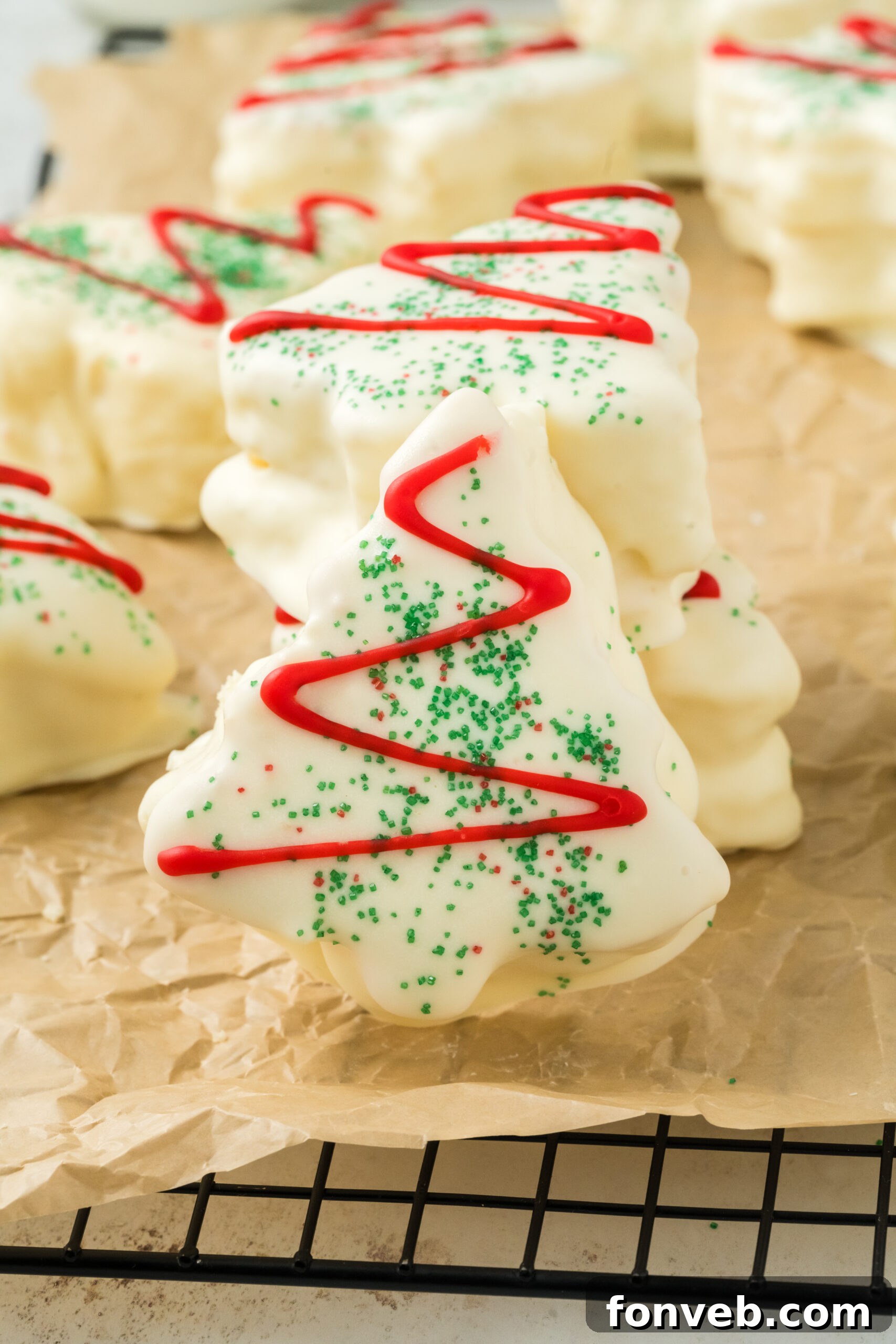 Christmas Tree Snack Cakes from Scratch 17 Side view of mini cakes in the shape of trees on a table