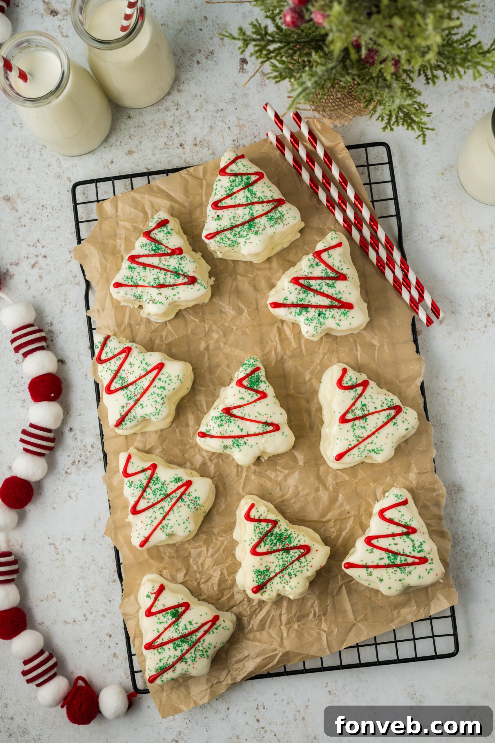 Christmas Tree Snack Cakes from Scratch 18 Overhead shot of dipped Christmas tree cakes on a baking tray