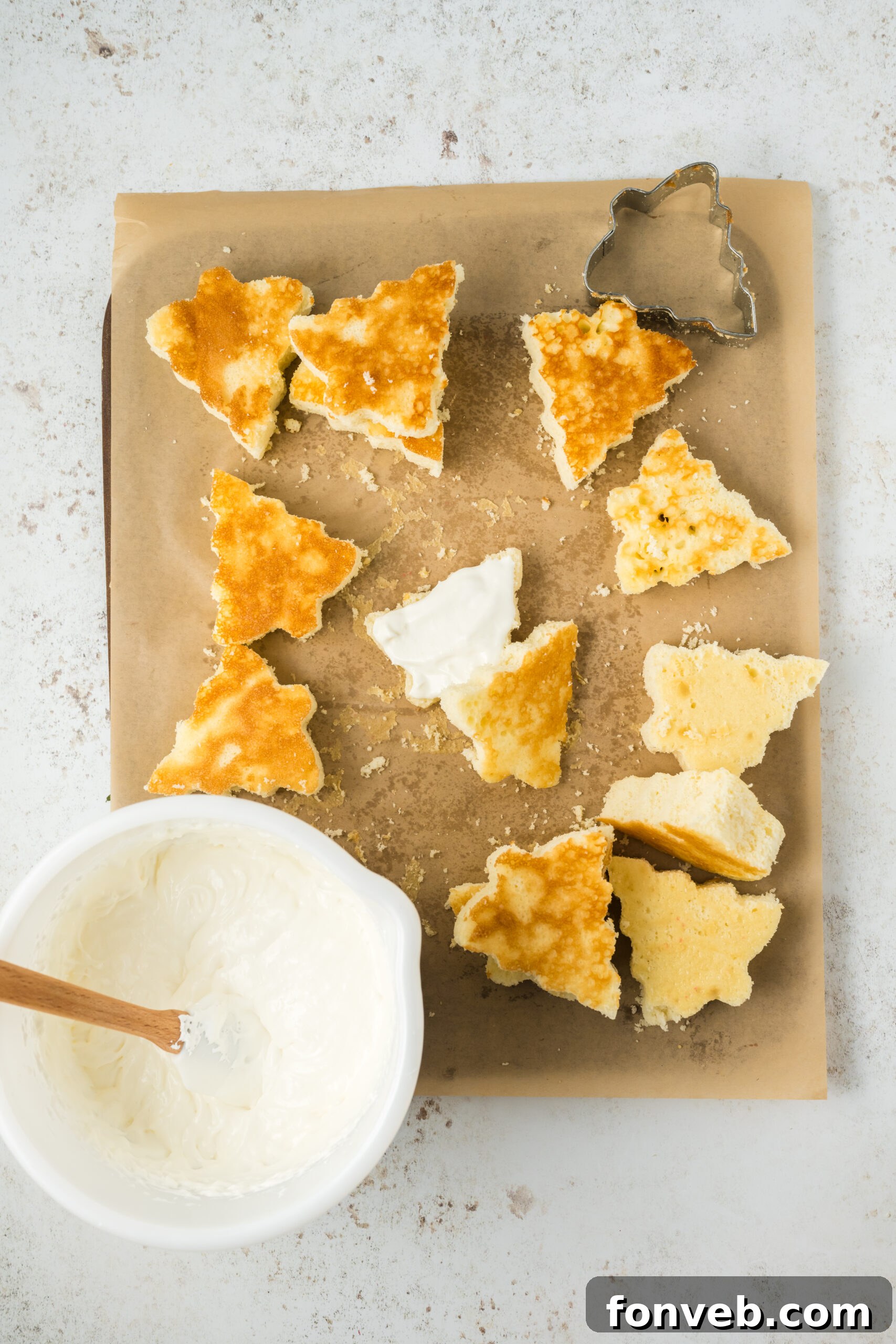 Christmas Tree Snack Cakes from Scratch 8 Applying creamy filling to the center of each cake half