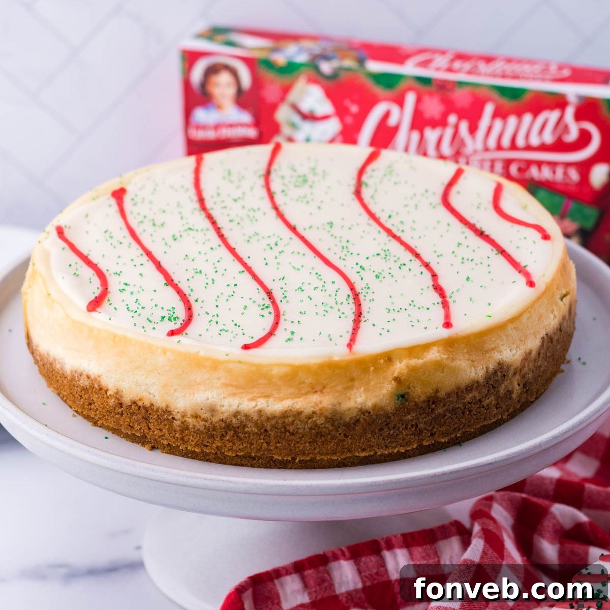Little Debbie Christmas Tree Cheesecake on a cake platter on table