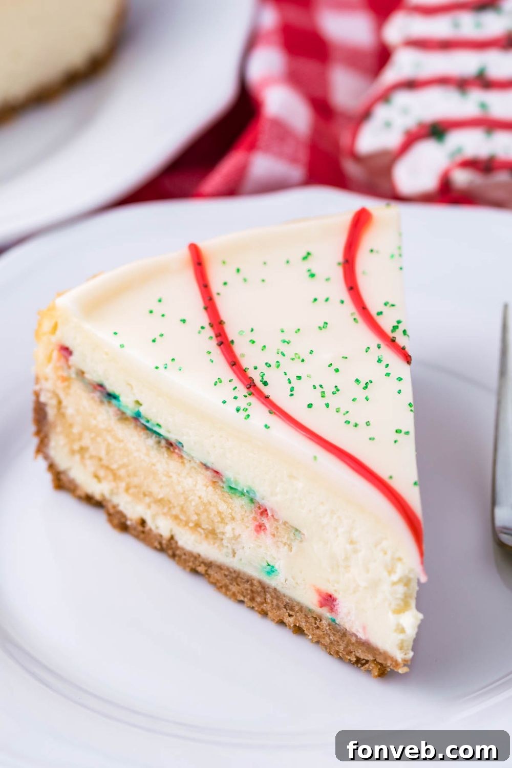 side view of Christmas cheesecake on plate