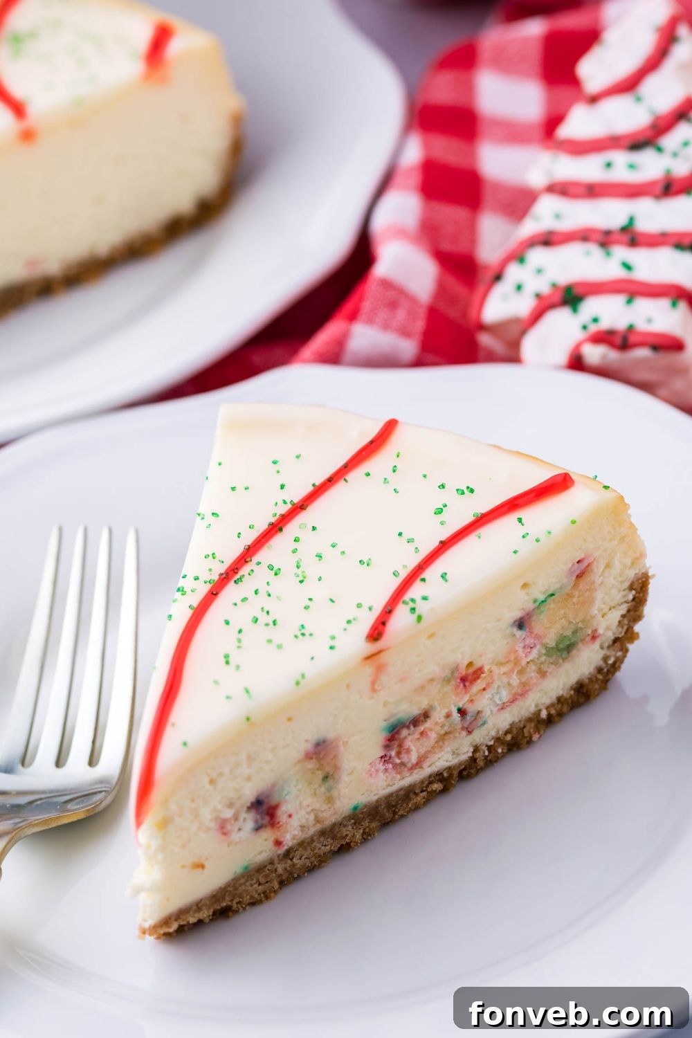 slice of a little debbie cheesecake on plate with fork by it