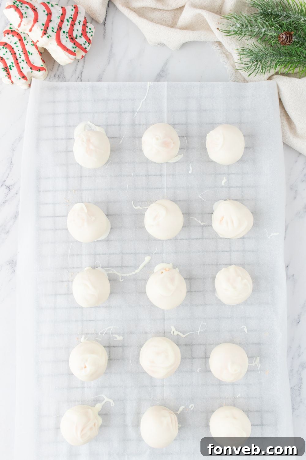 white chocolate truffles on cooling rack 