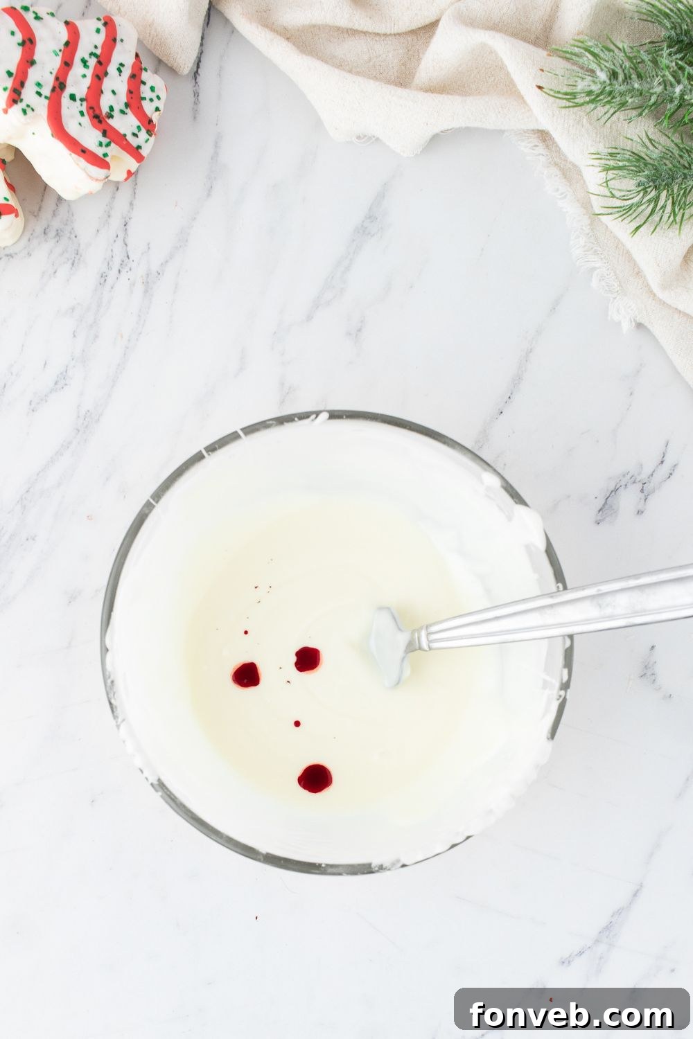 food coloring in a bowl of white chocoalte 