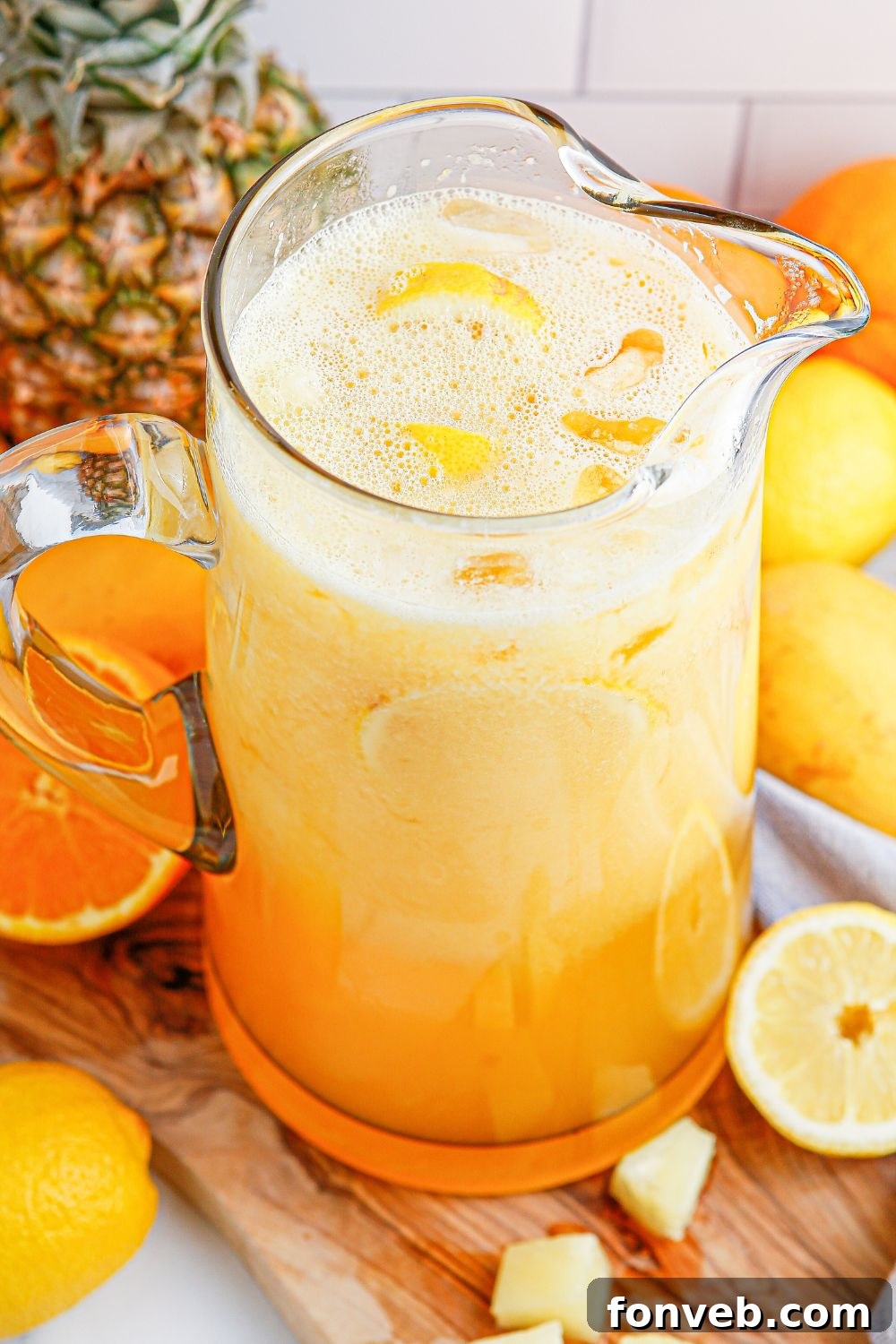 tropical fruit punch in a pitcher on table 