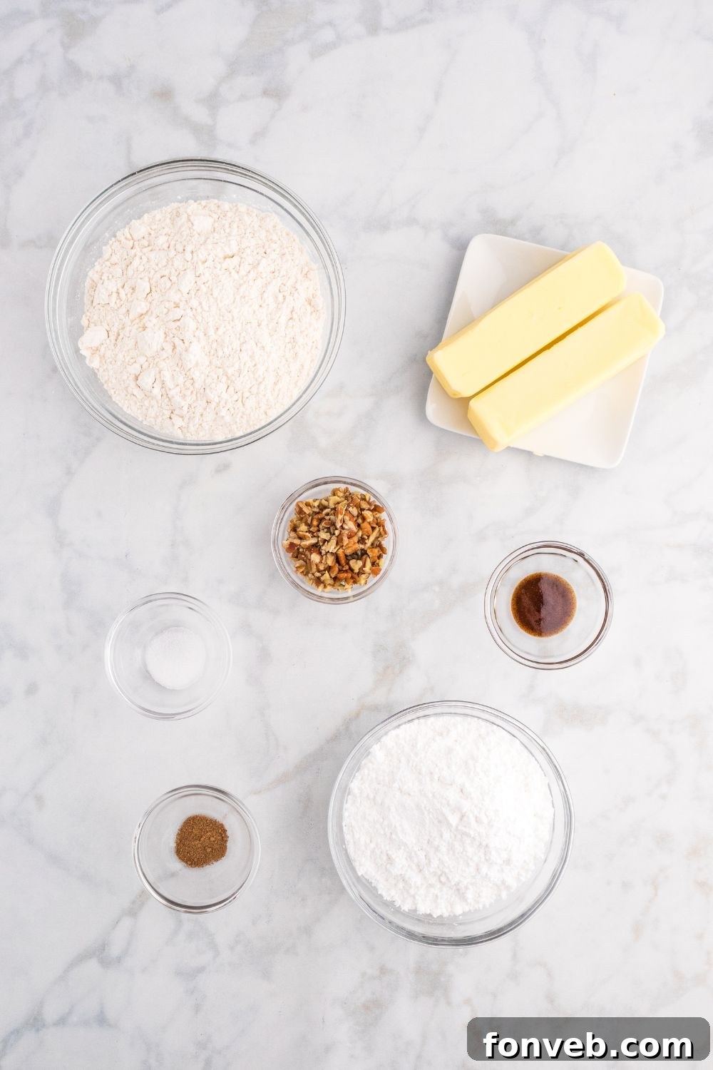 cookie ingredients on table in bowls and containers