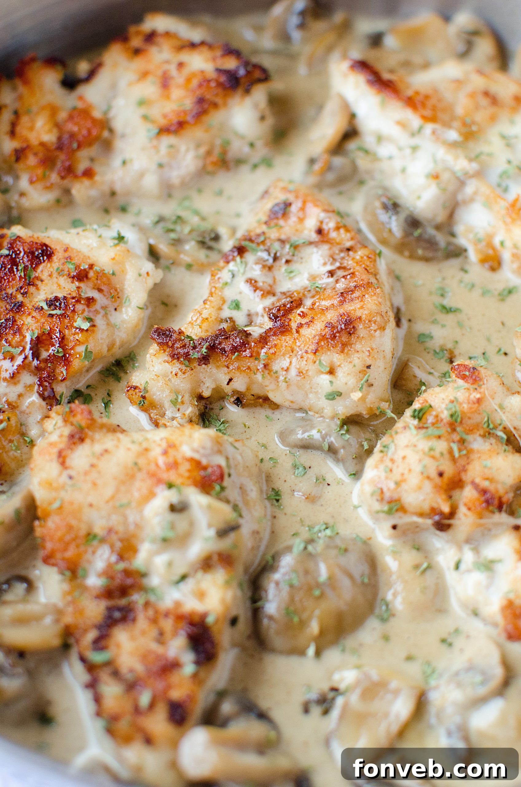 Serving of Creamy Asiago chicken on a plate, ready to be enjoyed